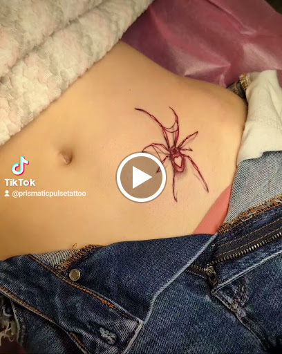 Explore dog tag tattoo ideas, creative tattoo ideas in Cornelia, available at Prismatic Pulse Tattoo