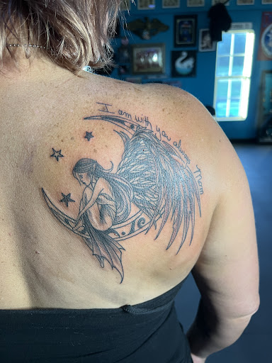 Explore wolf neck tattoo ideas, creative tattoo ideas in Talbott, available at Self Made Tattoo