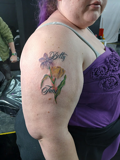 Explore snowboard tattoo ideas, creative tattoo ideas in Tulsa, available at Royal Ink Tattoos And Piercings