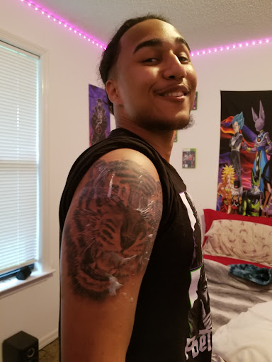Explore chest and neck tattoo ideas, creative tattoo ideas in Longwood, available at Trinity Tattoo Co Inc