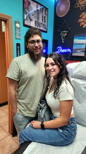 Find dino tattoo ideas for your next unique tattoo in Marysville at Hawaiian Touch Piercing Co.