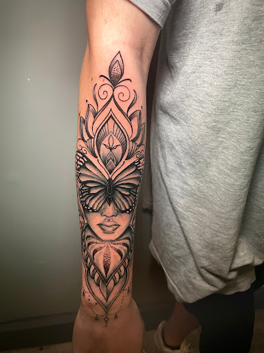 Explore tattoo name ideas on wrist, creative tattoo ideas in Atlanta, available at Iron Palm Tattoos & Body Piercing Atlanta