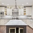 ALDA STONE: Granite & Quartz Countertops and Kitchen cabinets in Alberta.