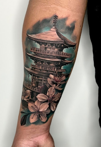 Find inbetween boob tattoo ideas for your next unique tattoo in Venice at Ink Monkey Tattoo and Piercing