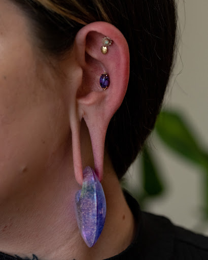 Explore tattoo ideas behind the ear, creative tattoo ideas in Cincinnati, available at Luminous Fine Jewelry and Piercing