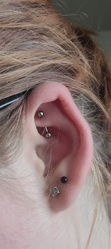 Find lion hand tattoo ideas for men for your next unique tattoo in Edmond at 15th Legion Tattoo & Body Piercing