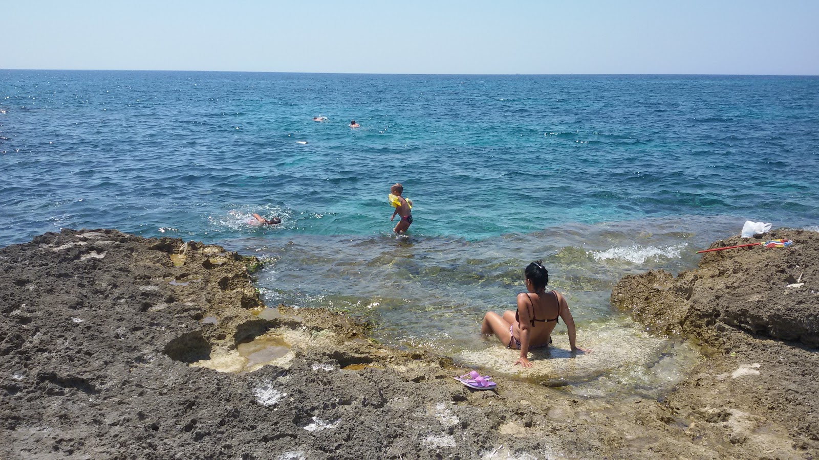 Spiaggia di Porto Franco'in fotoğrafı küçük koy ile birlikte