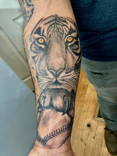 Explore name tattoos on arm ideas, creative tattoo ideas in Hudson, available at Twisted Canvas Tattoo and Art Studio