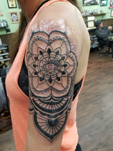 Find spinal cord tattoos ideas for your next unique tattoo in Orange at Leftys Tattoo