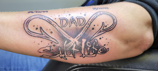 Explore saxophone tattoo ideas, creative tattoo ideas in Angola, available at Hoodlum Ink