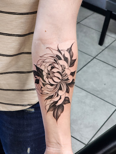 Explore hand name tattoo ideas, creative tattoo ideas in Las Cruces, available at Porter House Ink Piercing & Tattoo