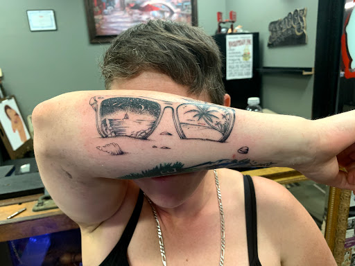 Explore woman face tattoo ideas, creative tattoo ideas in Satellite Beach, available at Rocksteady Tattoo Company