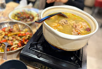 Plats et boissons du Restaurant chinois 李子坝梁山鸡LiZiBa ChongQing Chicken Pot à Paris - n°5