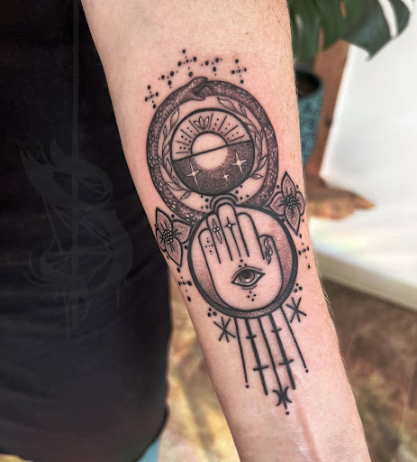 Explore dragon back tattoo ideas, creative tattoo ideas in Lopez Island, available at Soot and Bone Body Art Studio