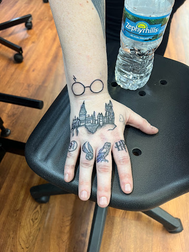 Explore alpha omega tattoo ideas, creative tattoo ideas in Cocoa, available at Rorschach Tattoo Shop and Piercing Studio