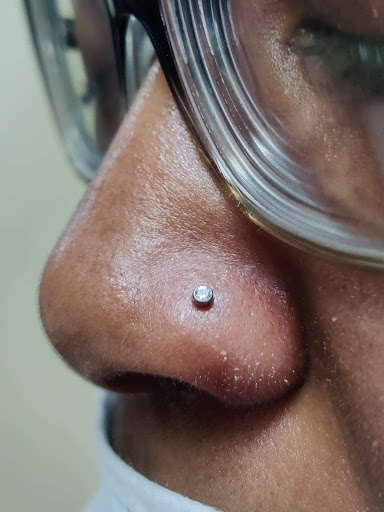 Explore neck tattoo cover up ideas, creative tattoo ideas in Romulus, available at Urban Rituals Piercing and Tattoo