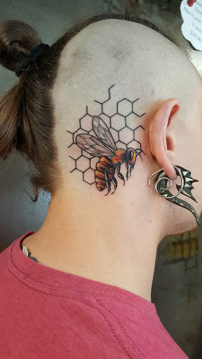 Explore unique side thigh tattoo ideas, creative tattoo ideas in Waukesha, available at Waukesha Tattoo Company Galleria Edge