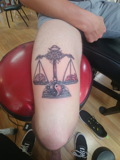 Explore quarter sized tattoo ideas, creative tattoo ideas in Liberty, available at Dark Lotus Tattoo & Salon
