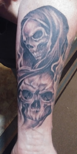 Explore dollar sign tattoo ideas, creative tattoo ideas in Alliance, available at Bad Boy Tattoo & Body Piercing