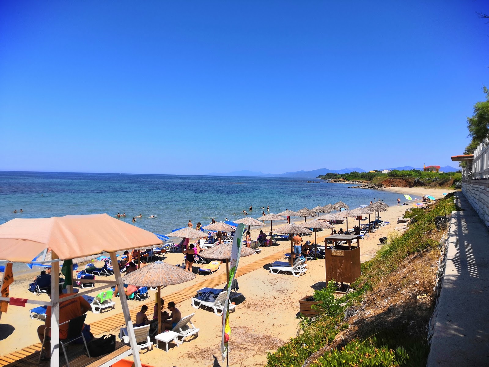 Photo of Alonaki beach with turquoise pure water surface