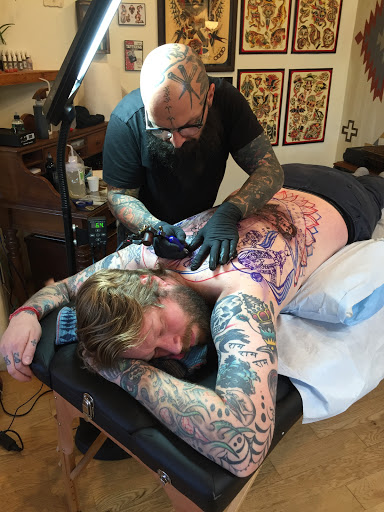 Explore hand tattoo ideas for men, creative tattoo ideas in Taos, available at Magical Tattoo