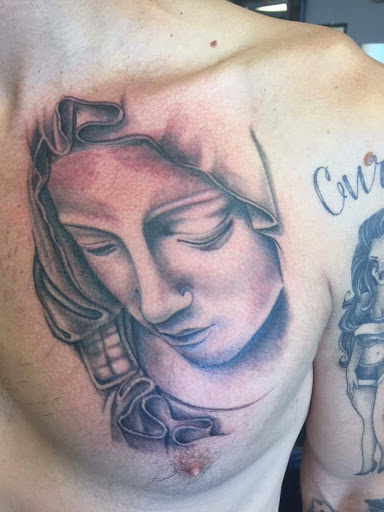 Explore rip tattoo ideas small, creative tattoo ideas in Tucson, available at Sacred Art Tattoo Studio