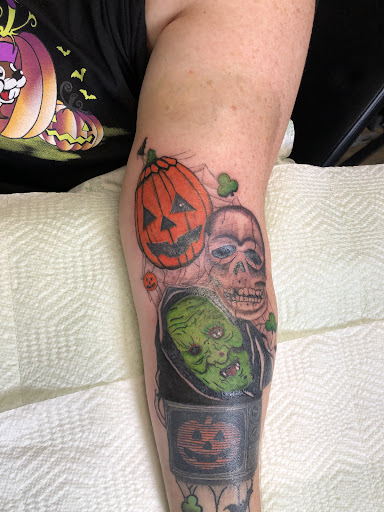 Explore ideas for rib tattoos, creative tattoo ideas in Lansing, available at CDM Inked Studio