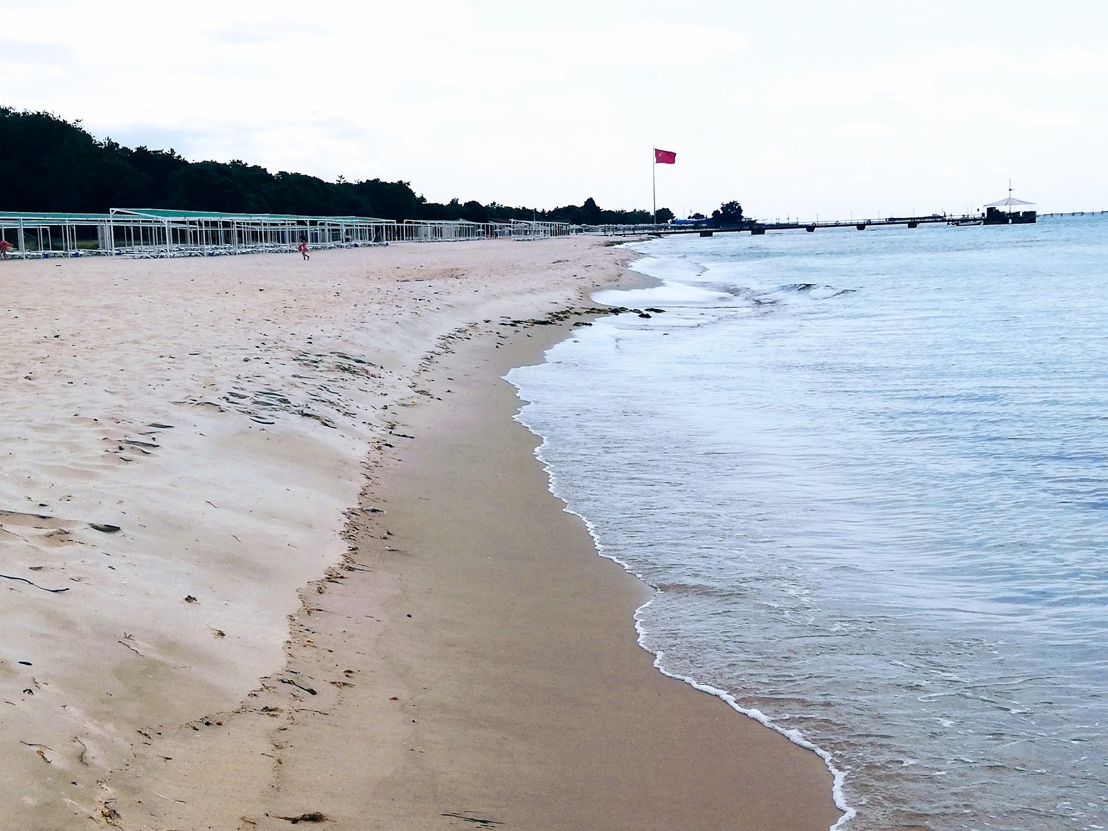 Foto von Dallas beach II mit beiger sand Oberfläche