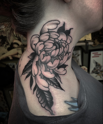 Find small palm tree tattoo ideas for your next unique tattoo in Johnson City at Gold Cross Tattoo Co.