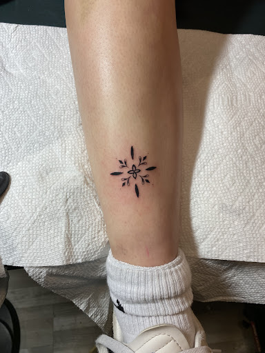 Explore iris flower tattoo ideas, creative tattoo ideas in San Jose, available at Legacy Tattoo