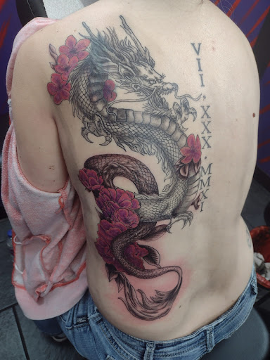 Explore half sleeve ocean tattoo ideas, creative tattoo ideas in Cadillac, available at Warchief Tattoo, LLC