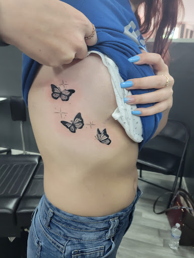 Explore ring finger tattoos ideas, creative tattoo ideas in Pine Knot, available at Waynes World Tattoo