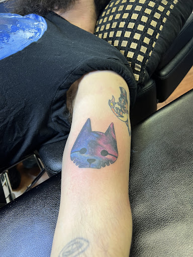 Explore elbow tattoo ideas for men, creative tattoo ideas in Cocoa, available at Rorschach Tattoo Shop and Piercing Studio