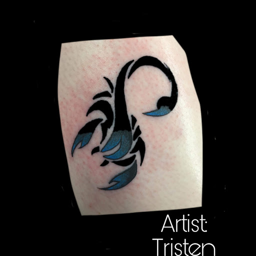 Explore book dragon tattoo ideas, creative tattoo ideas in Florence, available at West Coast Tattoo & Body Piercing