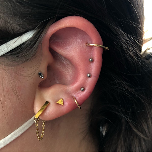 Explore women tattoos ideas, creative tattoo ideas in Grand Rapids, available at IRIS Piercing Studio