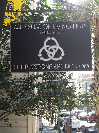 Explore lion forearm tattoo ideas, creative tattoo ideas in Charleston, available at MOLA Piercing and Fine Jewelry