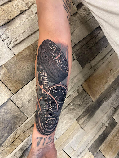 Explore tattoo ideas female thigh, creative tattoo ideas in Winter Haven, available at Aces Ink - Tattoos & Piercings