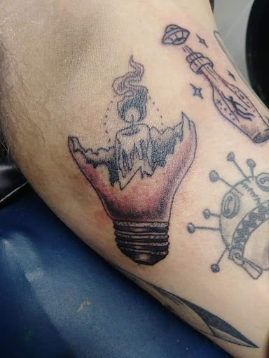 Explore father son tattoo ideas, creative tattoo ideas in Savannah, available at Tattoo Addictions