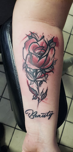 Explore rose tattoo idea, creative tattoo ideas in Ocala, available at Black Lotus Tattoo & Art Gallery Inc