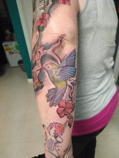 Explore half and half tattoo ideas, creative tattoo ideas in Homosassa, available at Citrus Tattoos