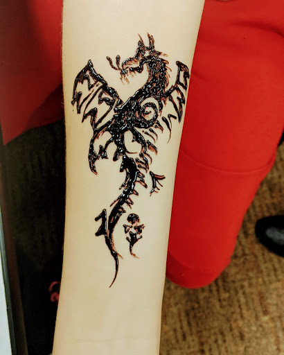 Explore heart with wings tattoo ideas, creative tattoo ideas in Concord, available at Naseera Fazil Henna Art