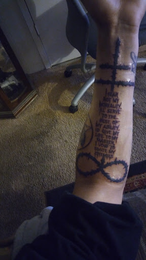 Explore catholic tattoo ideas for guys, creative tattoo ideas in Hesperia, available at Tattoo Image