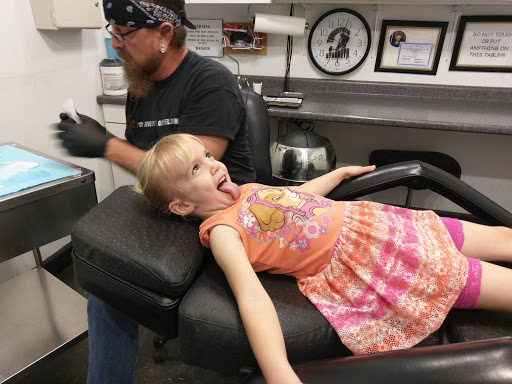 Explore tramp tattoo ideas, creative tattoo ideas in Warrensburg, available at The Zone Tattoo & Body Piercing