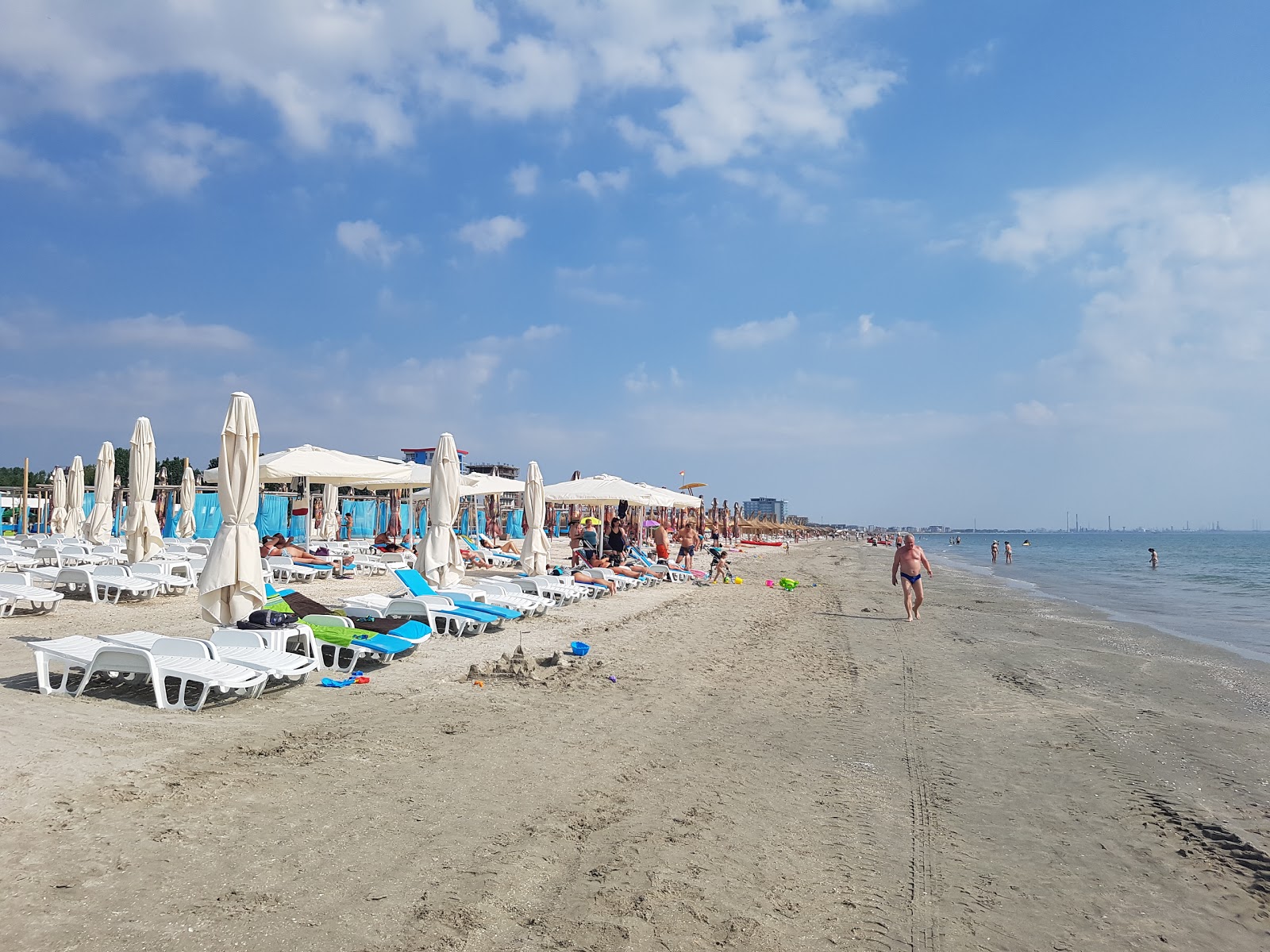 Foto von Kudos Strand mit türkisfarbenes wasser Oberfläche