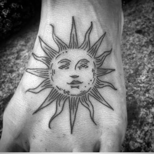 Explore skull and crossbones tattoo ideas, creative tattoo ideas in Atlanta, available at Big Cat Tattoo