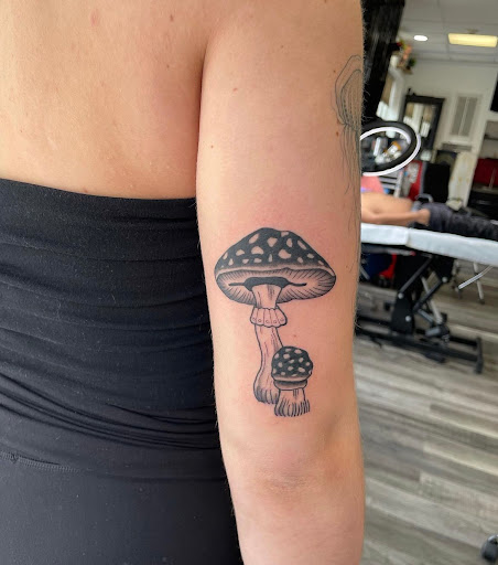 Explore name neck tattoo ideas, creative tattoo ideas in Jersey City, available at 7 Souls Tattoo & Body Piercing