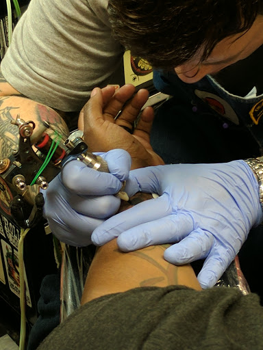 Explore upper back tattoo ideas, creative tattoo ideas in Milwaukee, available at MANIA Tattoos Milwaukee