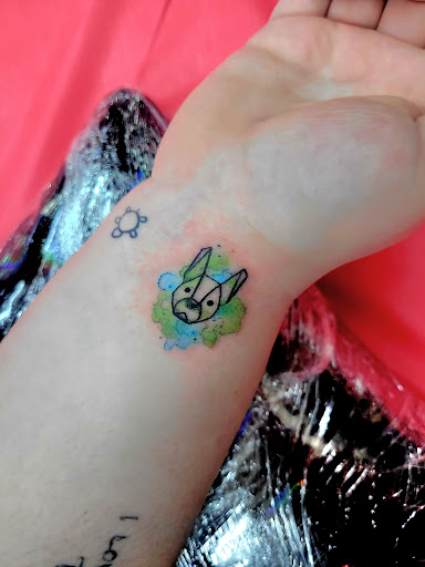 Explore gnome tattoo ideas, creative tattoo ideas in Benton, available at Spectrum Tattoo