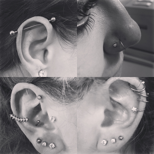 Explore cross tattoo ideas for guys, creative tattoo ideas in Palm Harbor, available at Angry Owl Tattoo and Piercing