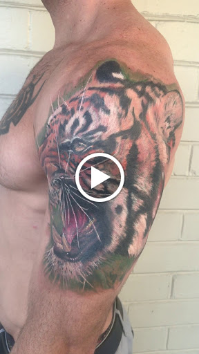 Find top of shoulder tattoo ideas for your next unique tattoo in Ocala at The Tattoo Gallery of Ocala LLC